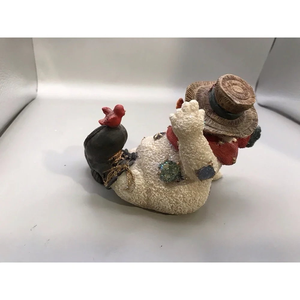 Resin Snowman Kicked‎ Back With A Bird On His Foot
